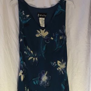 Floor length floral dress.